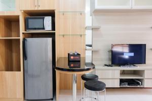 Brand New Cozy Studio at Scientia Apartment By Travelio