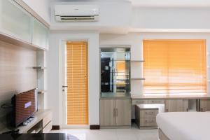 Brand New Cozy Studio at Scientia Apartment By Travelio