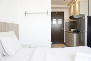 Minimalist Studio Apartment at The Suite @Metro By Travelio