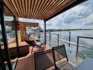 Vie&scaron;butis Mermaid-Hausboote Laboe Vokietija