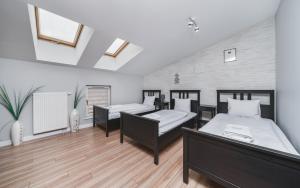 Deluxe Apartments Kraków Brzozowa by Noclegi Renters