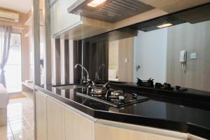 Homey Studio Apartment at M-Town Residence near Summarecon Mall Serpong By Travelio