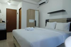 Studio near Bella Terra Mall at Tifolia Apartment By Travelio