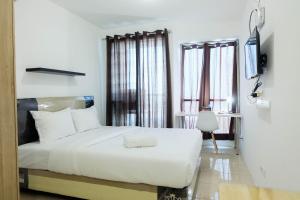 Studio near Bella Terra Mall at Tifolia Apartment By Travelio
