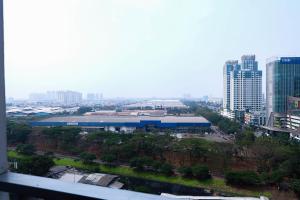 Studio near Bella Terra Mall at Tifolia Apartment By Travelio