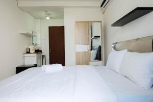 Studio near Bella Terra Mall at Tifolia Apartment By Travelio
