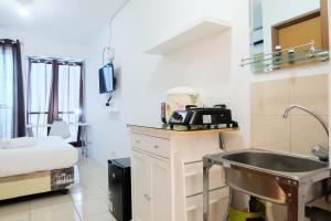 Studio near Bella Terra Mall at Tifolia Apartment By Travelio