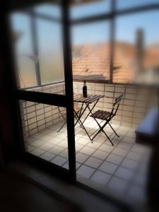 Quarto com 4 camas (Beliches+ 1 Sofá-cama)