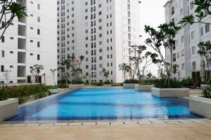 Comfort 2BR at Bassura City Cipinang Apartment By Travelio