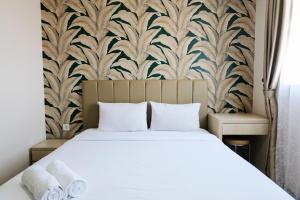 Brand New and Comfy Studio Bintaro Icon Apartment By Travelio