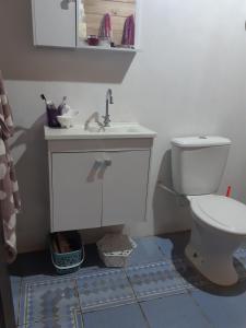 Casa Rústica praia da Ferrugem próximo praia com piscina compartilhada