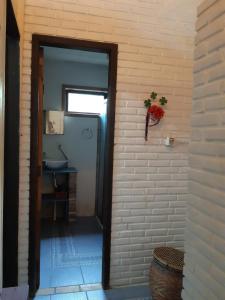 Casa Rústica praia da Ferrugem próximo praia com piscina compartilhada