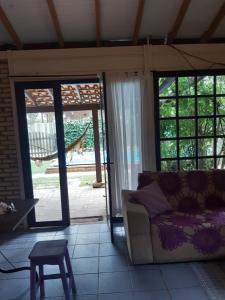 Casa Rústica praia da Ferrugem próximo praia com piscina compartilhada