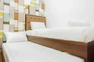 City View 2BR Apartment Bassura City near Shopping Mall By Travelio