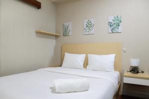 Cozy 1BR Apartment Grand Kamala Lagoon By Travelio