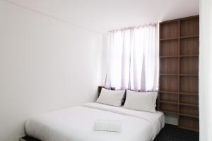 Modern City View Studio Apartment at Tuscany Residences By Travelio