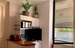Appartements L'Art Studio hyper centre : photos des chambres