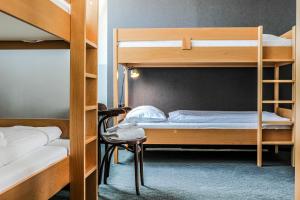 Bed in 6-Bed Mixed Dormitory Room room in Koncept Hotel Liebelei - contactless check-in
