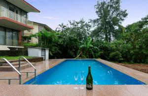 Pura Vida by StayVista - A hill-view villa with Modern interiors & Swimming pool