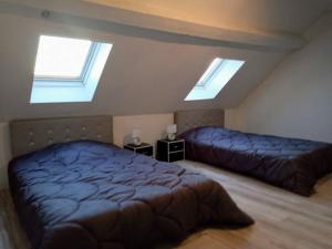 Appartements duplex agreable et calme : photos des chambres