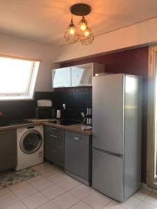 Appartements Le petit coin de Paradis : photos des chambres
