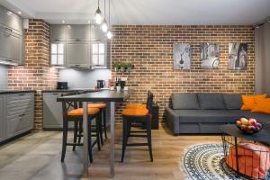 Orange, modern apartment in the city centre