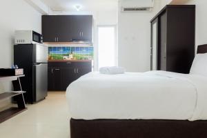 New Studio at Bassura City Apartment near Shopping Mall By Travelio