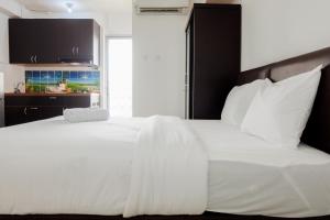 New Studio at Bassura City Apartment near Shopping Mall By Travelio
