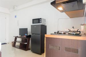 New Studio at Bassura City Apartment near Shopping Mall By Travelio