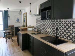 Latelier dartiste charmant T2 centre historique