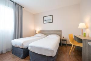 Hotels Comfort Aparthotel Saint-Nazaire Les Portes de l Ocean : photos des chambres