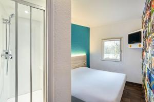 Hotels hotelF1 Les Ulis Courtaboeuf : photos des chambres