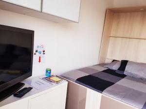 Appartements SW Cosy Apart - Paris Le Bourget Roissy CDG : photos des chambres