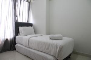 Wonderful 2BR at Gold Coast Apartment Pantai Indah Kapuk By Travelio