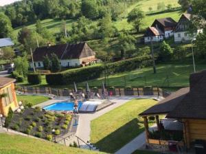 Agrodomki z bali Konradow