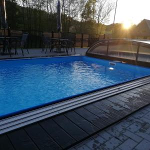 Agrodomki z bali Konradow