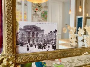 Appartements Home Chic Home - Les Suites de La Comedie : photos des chambres