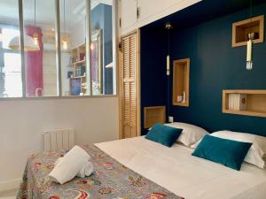 Appartements Home Chic Home - Les Suites de La Comedie : photos des chambres