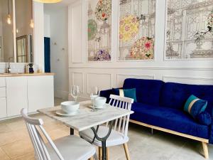 Appartements Home Chic Home - Les Suites de La Comedie : photos des chambres