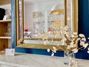 Appartements Home Chic Home - Les Suites de La Comedie : photos des chambres