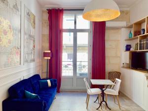 Appartements Home Chic Home - Les Suites de La Comedie : photos des chambres