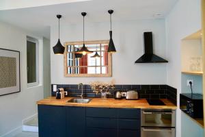Appartements Home Chic Home - Les Suites de La Comedie : photos des chambres