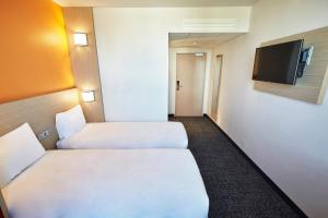 Hotels Premiere Classe Clermont Ferrand Centre : photos des chambres