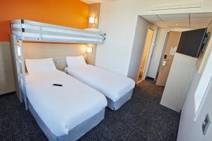 Hotels Premiere Classe Clermont Ferrand Centre : photos des chambres