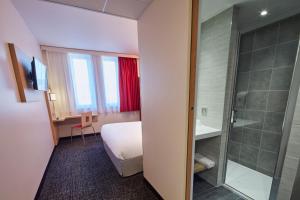 Hotels Premiere Classe Clermont Ferrand Centre : photos des chambres