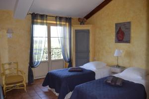 Maisons d'hotes La Bastide des Amouriers : photos des chambres