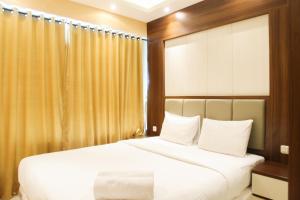 Modern 2BR Grand kamala Lagoon Apartment By Travelio