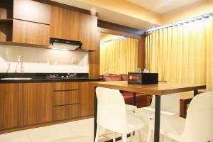 Modern 2BR Grand kamala Lagoon Apartment By Travelio