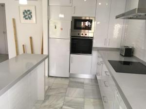 Luminoso apartamento en playa las redes, entorno natural pinares y dunas. Wifi