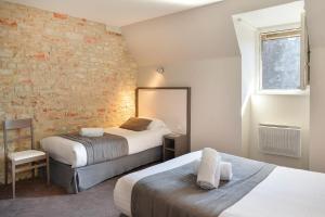 Hotels Logis Hotel Restaurant Le Puits Dore : photos des chambres